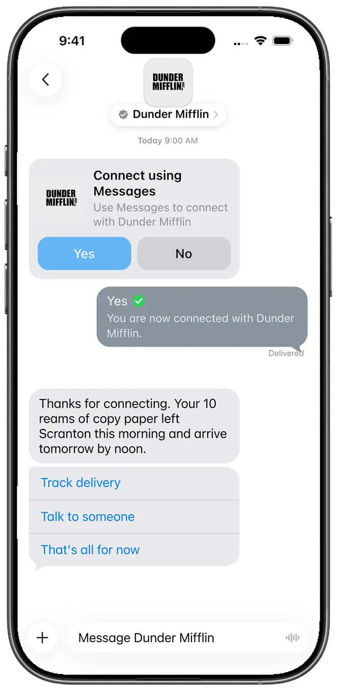 After tapping Yes, Dunder Mifflin sends a delivery update with quick replies